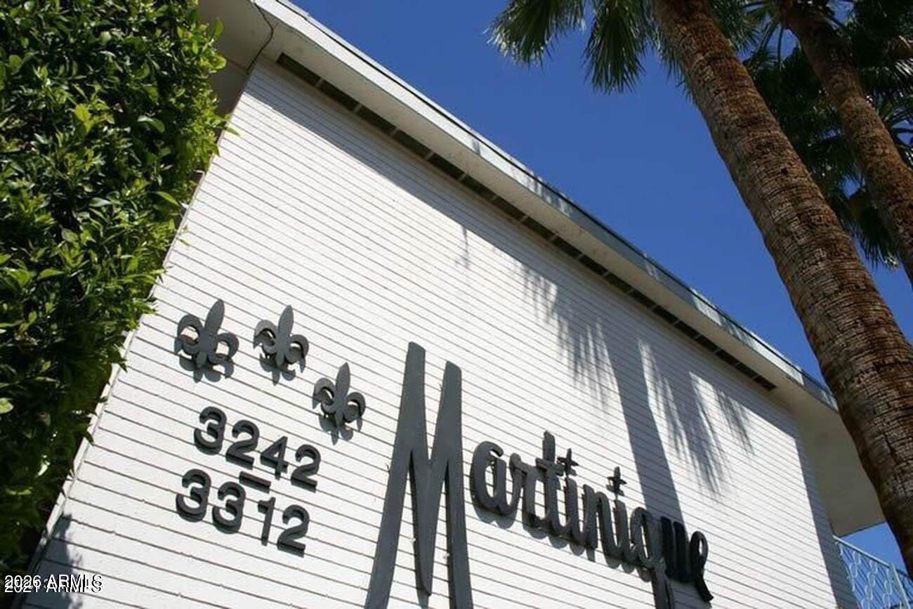 3242 East Camelback Road, Unit 104 Phoenix, AZ 85018 - Photo 18 of 19 a view of a backyard with a swing