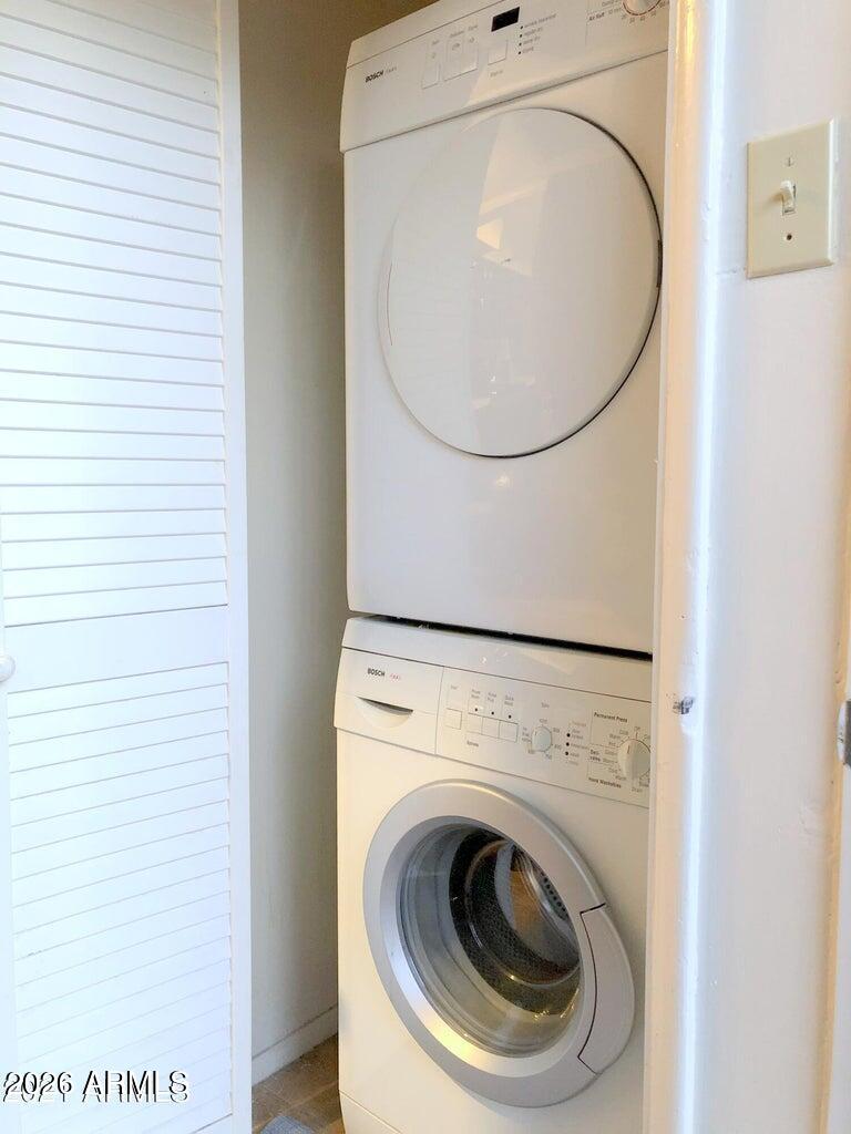 3242 East Camelback Road, Unit 104 Phoenix, AZ 85018 - Photo 19 of 19 a close view of a utility room with dryer and washer