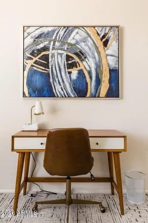 a living room with a couch and a table