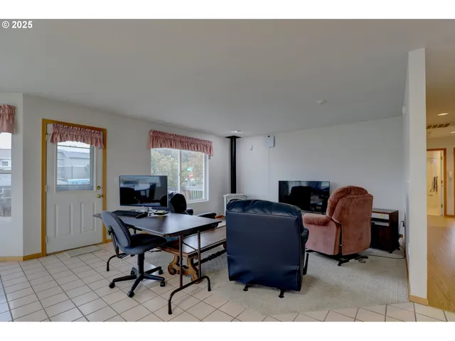 a workspace with furniture and window