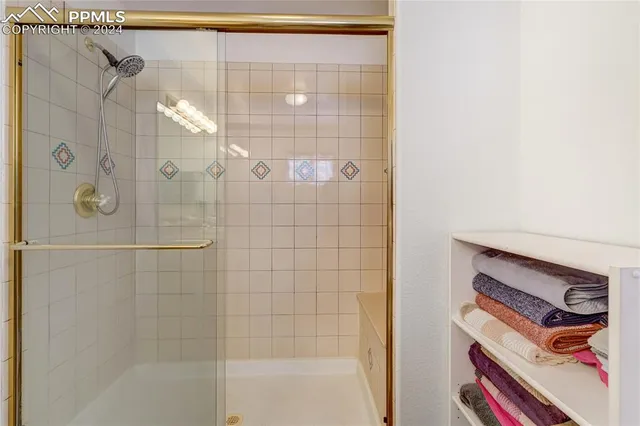 a view of a livingroom with furniture and a window
