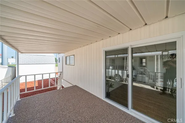 view of an empty room with glass door