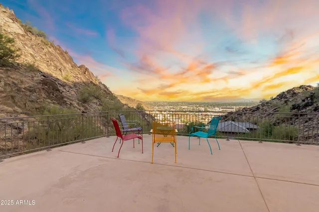 a side view of a house with a yard