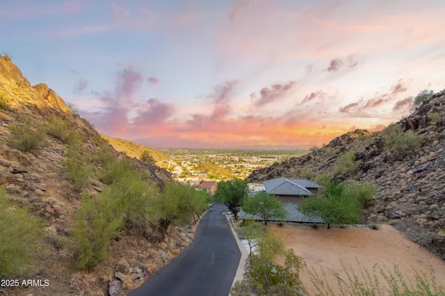 a view of a lake with mountains in the background