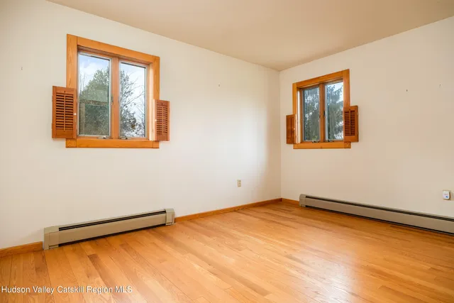 a view of a room with a window