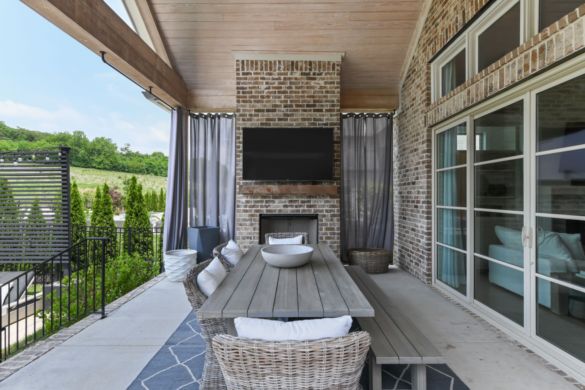 3577 Creamery Brg Road Thompson's Station, TN 37179 - Photo 35 of 42 a view of a balcony with floor to ceiling windows with wooden floor