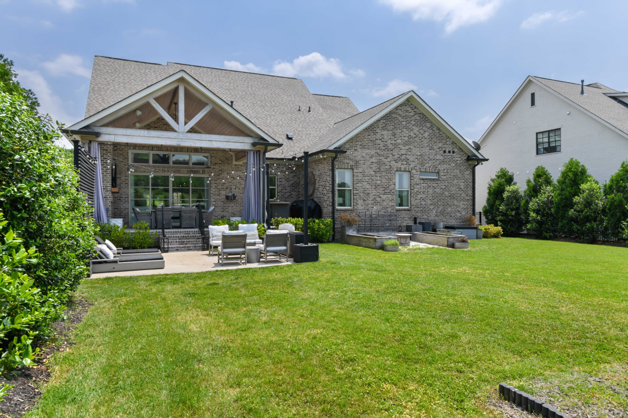 3577 Creamery Brg Road Thompson's Station, TN 37179 - Photo 38 of 42 a front view of a house with table and chairs