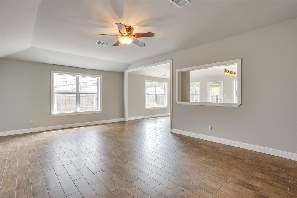 9825 Stoney Bridge Road Fort Worth, TX 76108 - Photo 4 of 40 View of living room looking into the dining & kitchen.