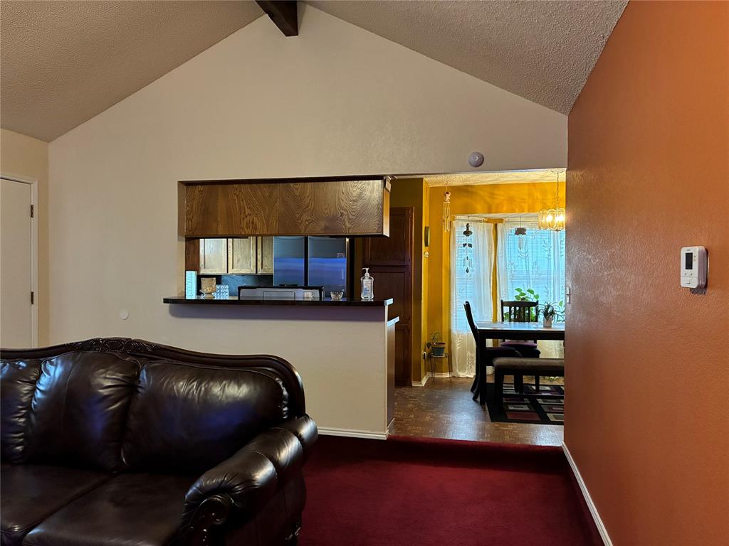 8430 Retta Mansfield Road Mansfield, TX 76063 - Photo 11 of 17 a living room with furniture and a wooden floor