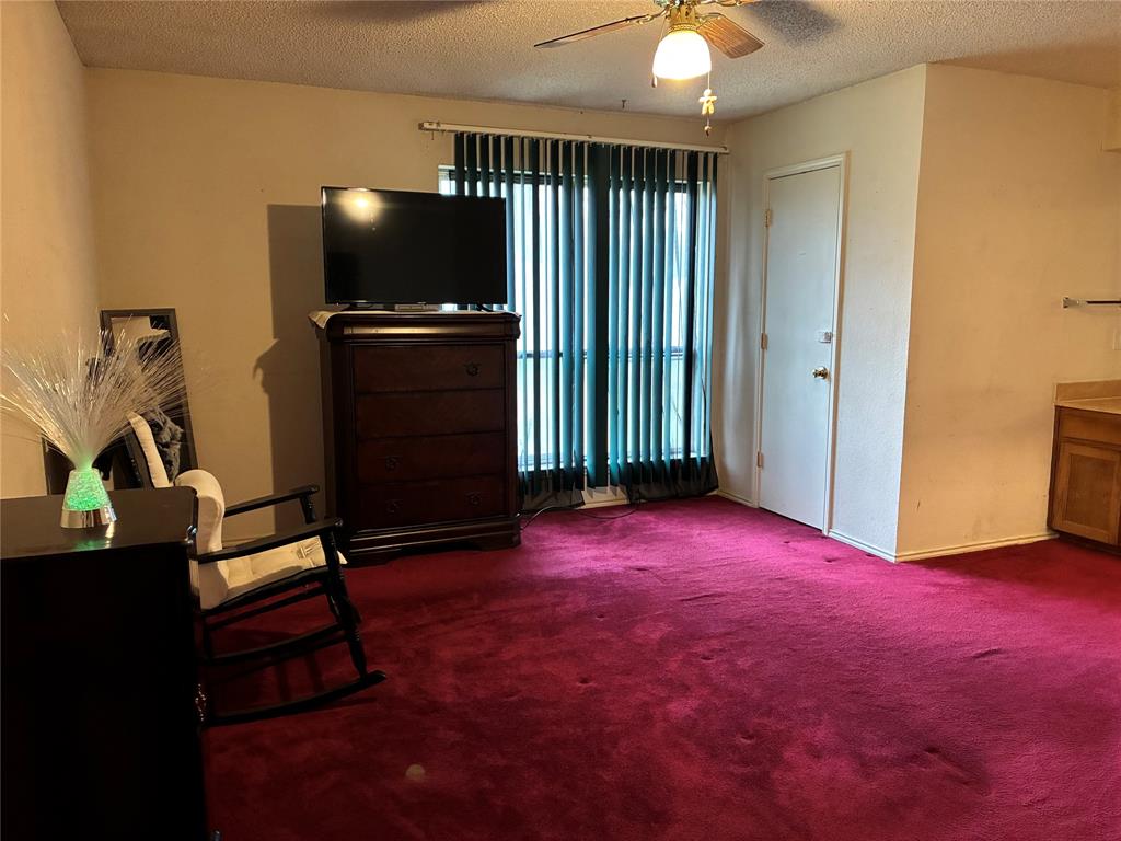 8430 Retta Mansfield Road Mansfield, TX 76063 - Photo 13 of 17 a view of a room with gym equipment