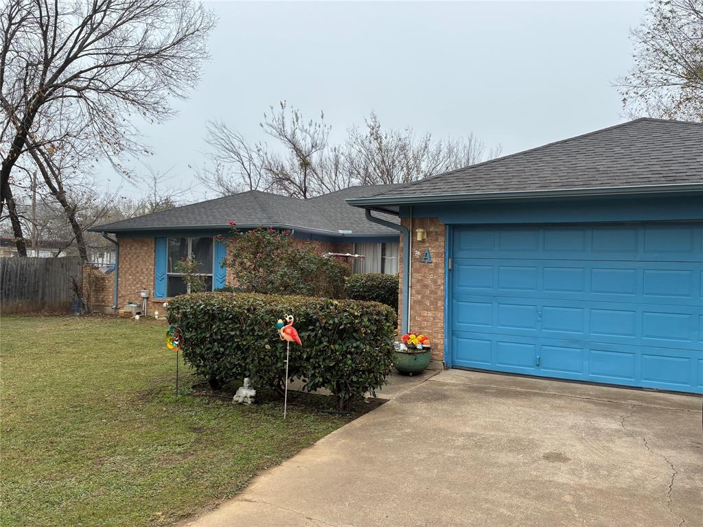 8430 Retta Mansfield Road Mansfield, TX 76063 - Photo 2 of 17 a view of a house with a patio