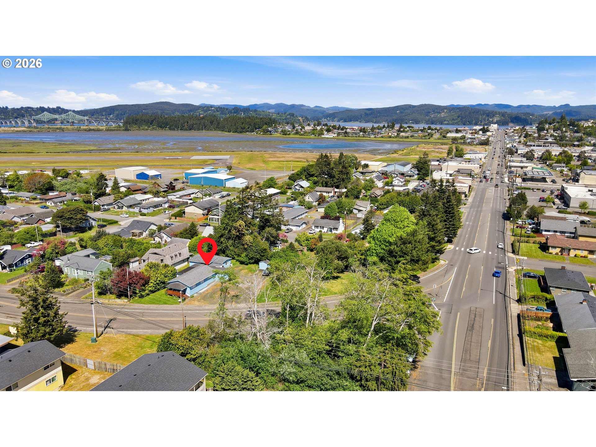 1955 Maple Street North Bend, OR 97459 - Photo 1 of 48 a view of lake and mountain