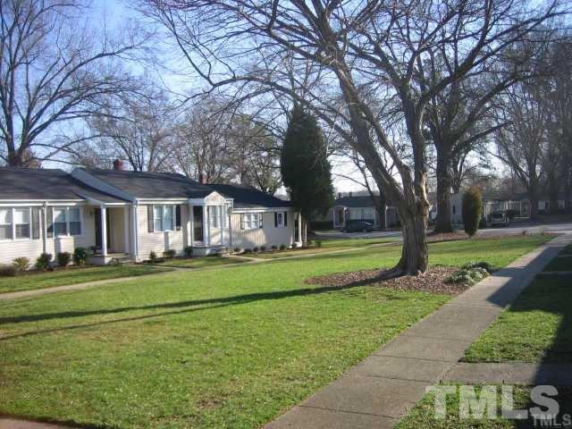 2618 McNeil Street Raleigh, NC 27608 - Photo 1 of 3 a front view of a house with a yard