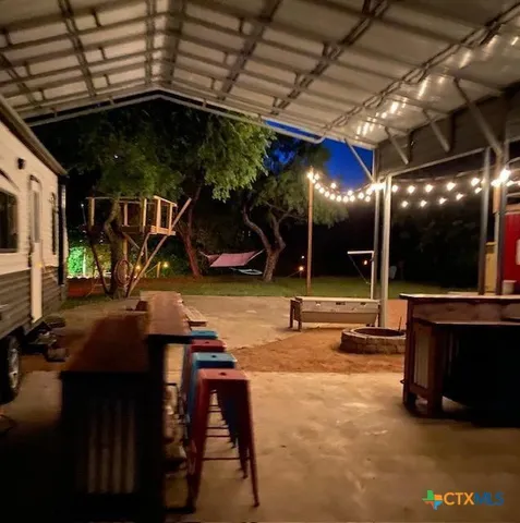 a view of a lake with houses in the back