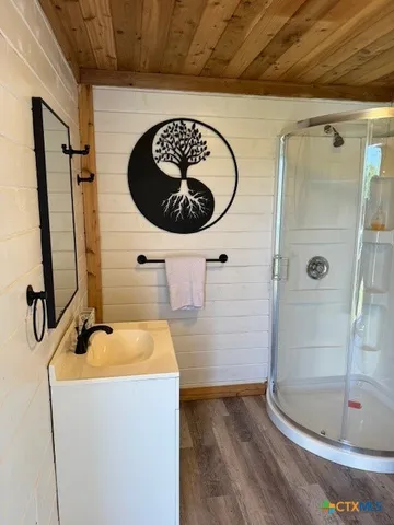 a bathroom with a sink and a mirror