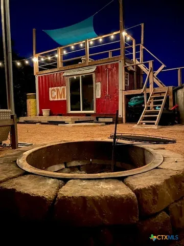 a kitchen with a stove and a cabinet