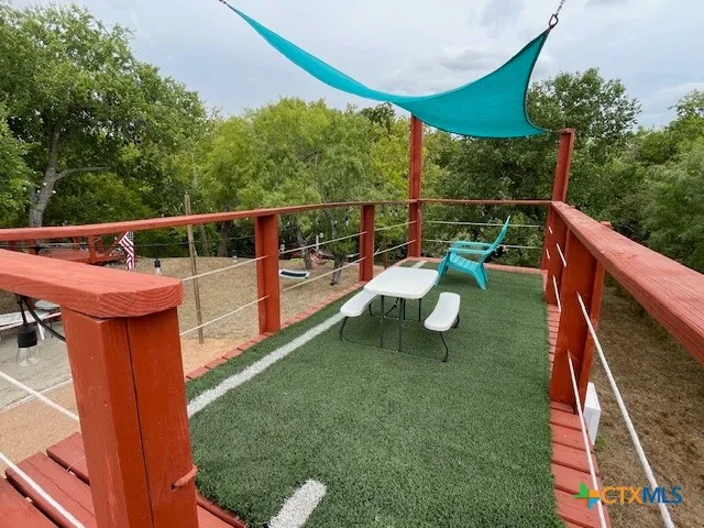 a view of a deck with chairs