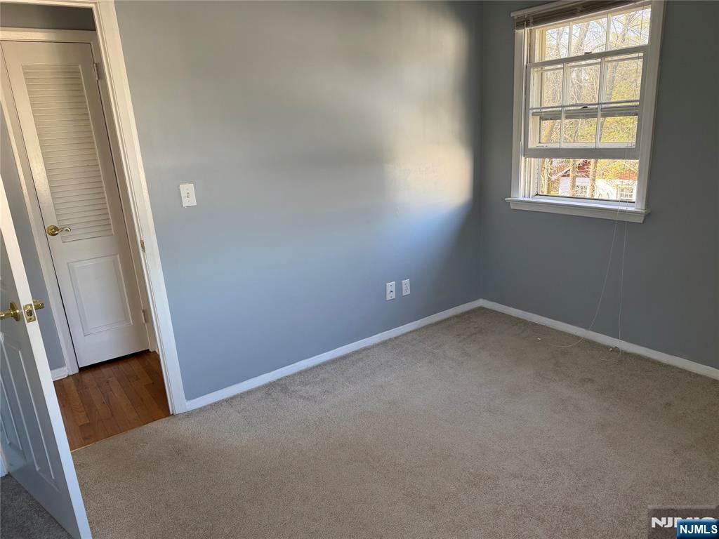 39 Franklin Street, Unit 2 Tenafly, NJ 07670 - Photo 21 of 27 an empty room with windows