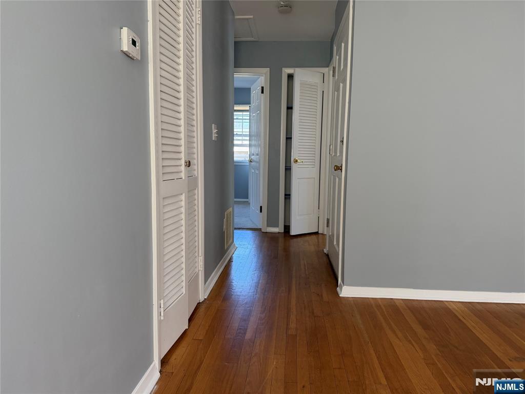 39 Franklin Street, Unit 2 Tenafly, NJ 07670 - Photo 23 of 27 a view of a hallway with wooden floor