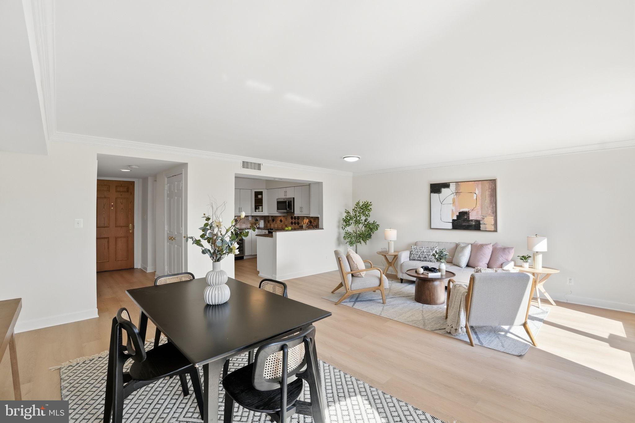 1080 Wisconsin Avenue Northwest, Unit 305 Washington, DC 20007 - Photo 8 of 27 Dining and living room