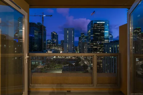a view of a terrace with couches and sky view