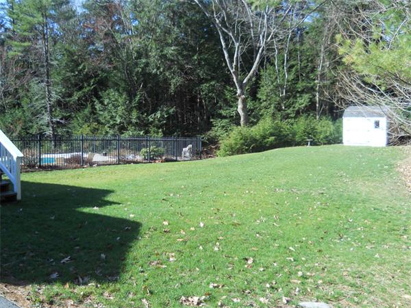 65 Young Road Ashburnham, MA 01430 - Photo 20 of 22 a view of a garden with a tree