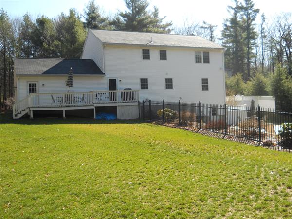 65 Young Road Ashburnham, MA 01430 - Photo 21 of 22 a view of a house with a backyard