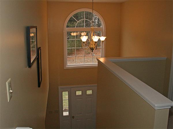 65 Young Road Ashburnham, MA 01430 - Photo 10 of 22 a view of a hallway with windows