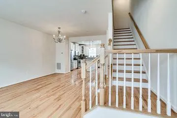 a view of entryway with wooden floor