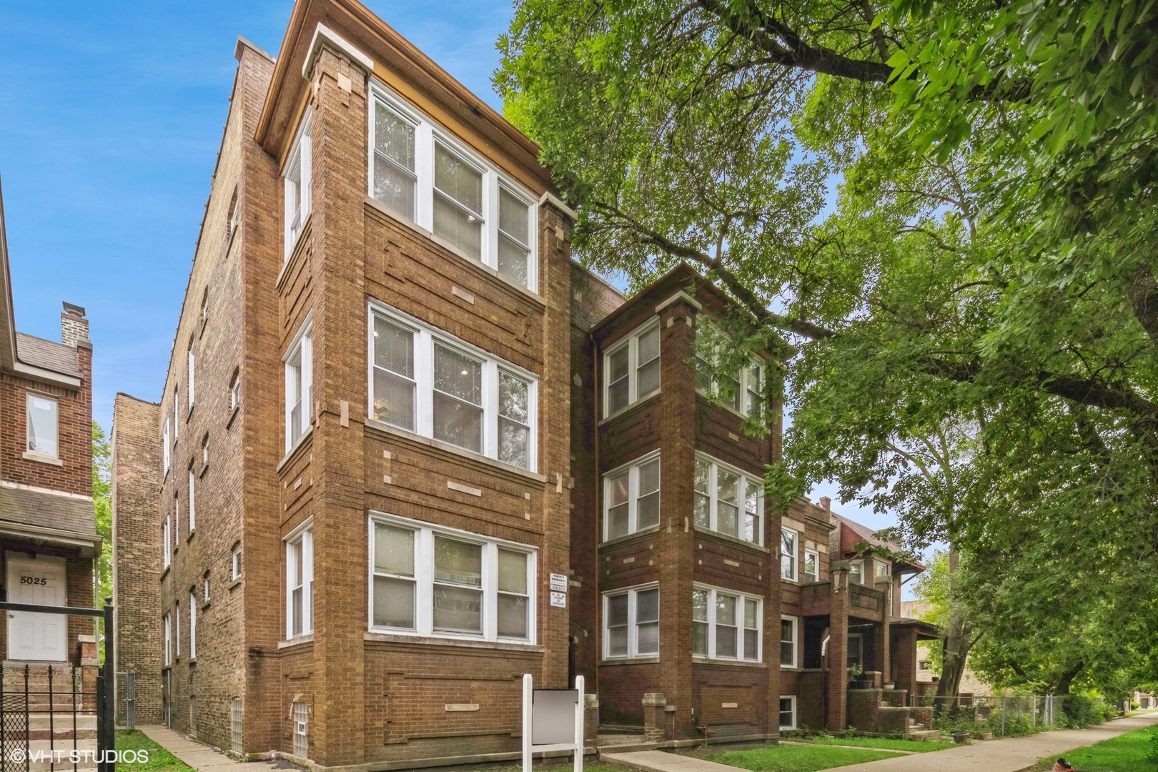 a front view of a multi story residential apartment building