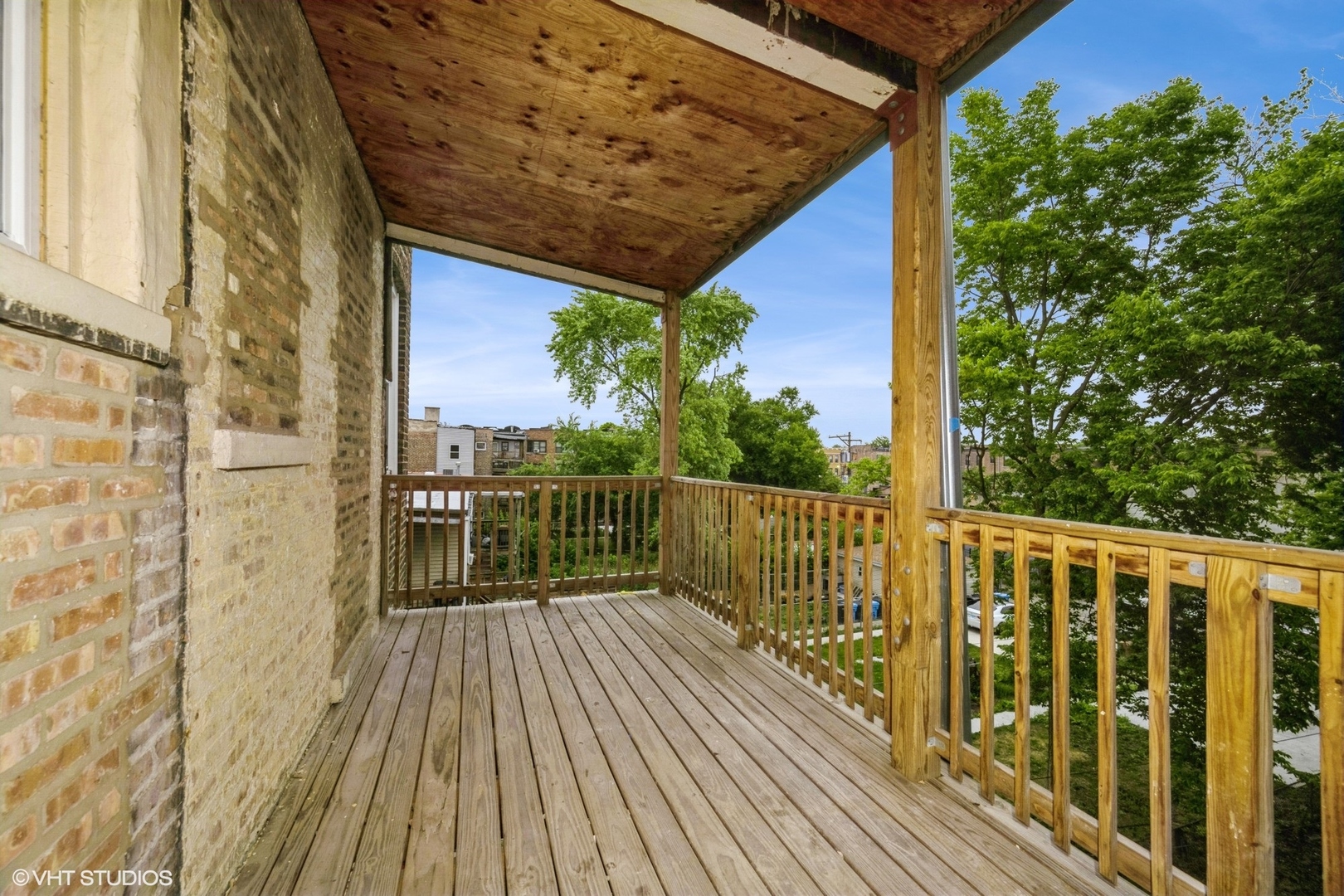 5027-29 West Washington Boulevard Chicago, IL 60644 - Photo 20 of 33 a balcony with wooden floor