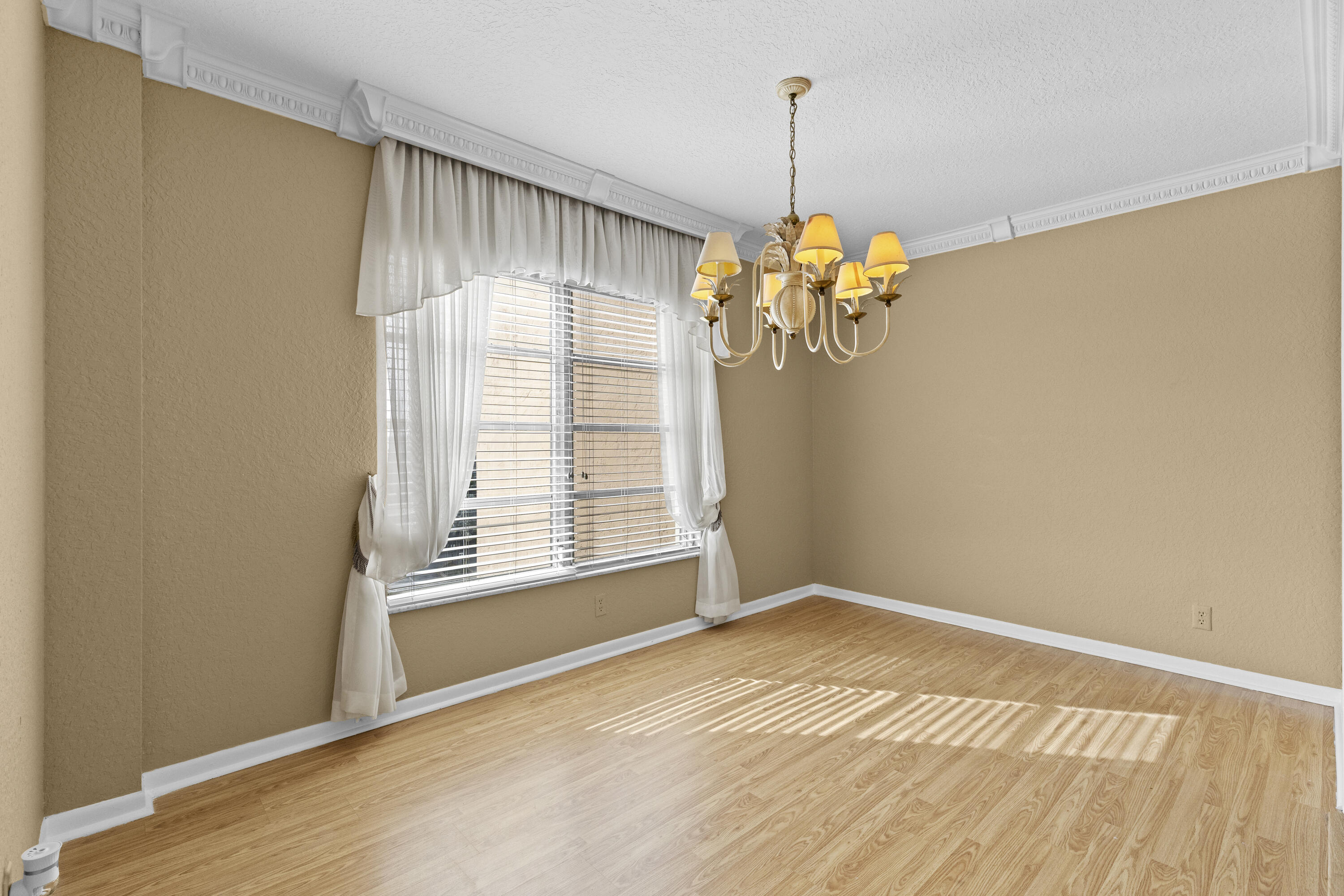 10777 West Sample Road, Unit 719 Coral Springs, FL 33065 - Photo 10 of 44 a view of empty room with window