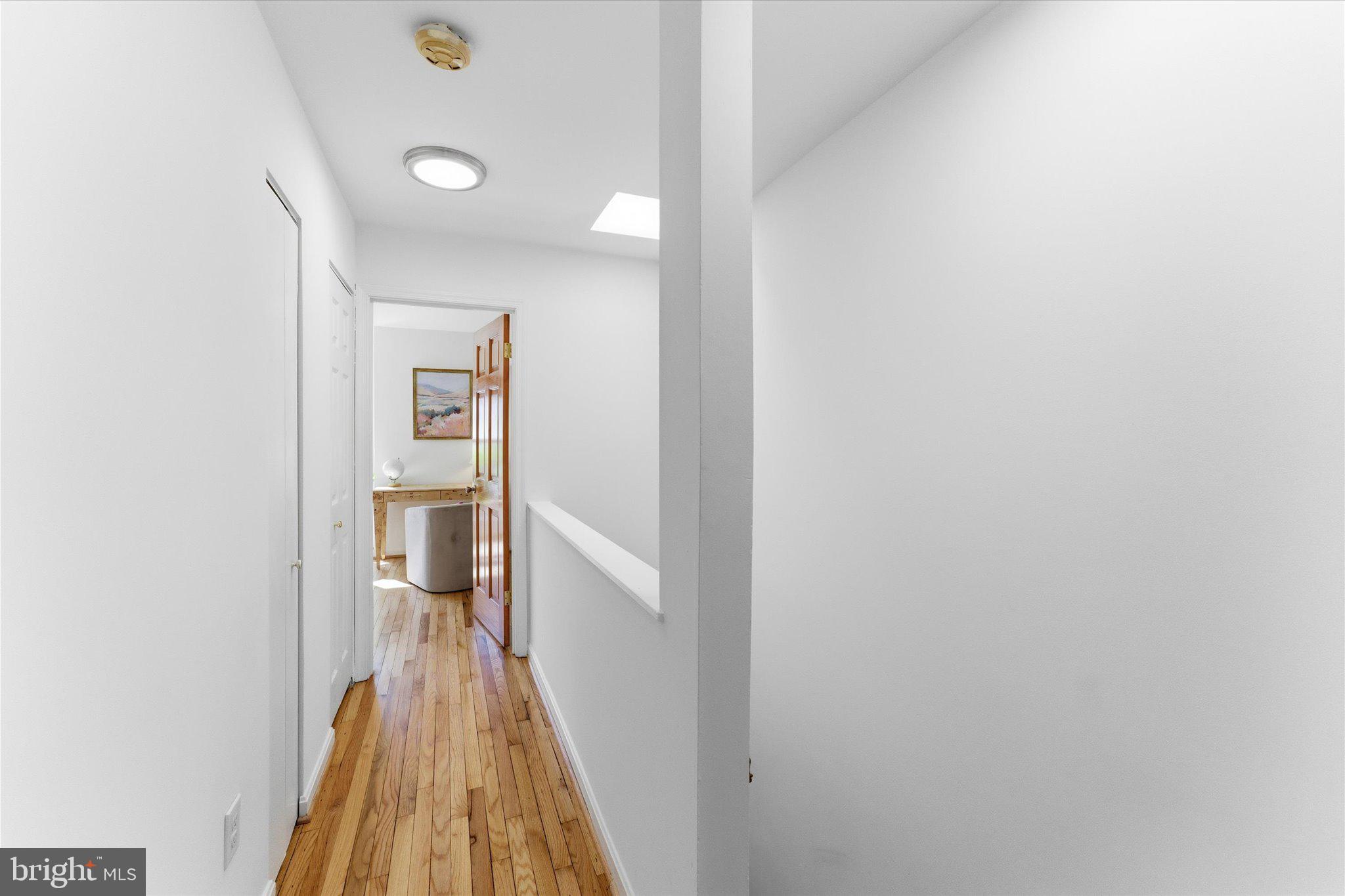1645 Park Road Northwest Washington, DC 20010 - Photo 15 of 28 a view of a room with wooden floor