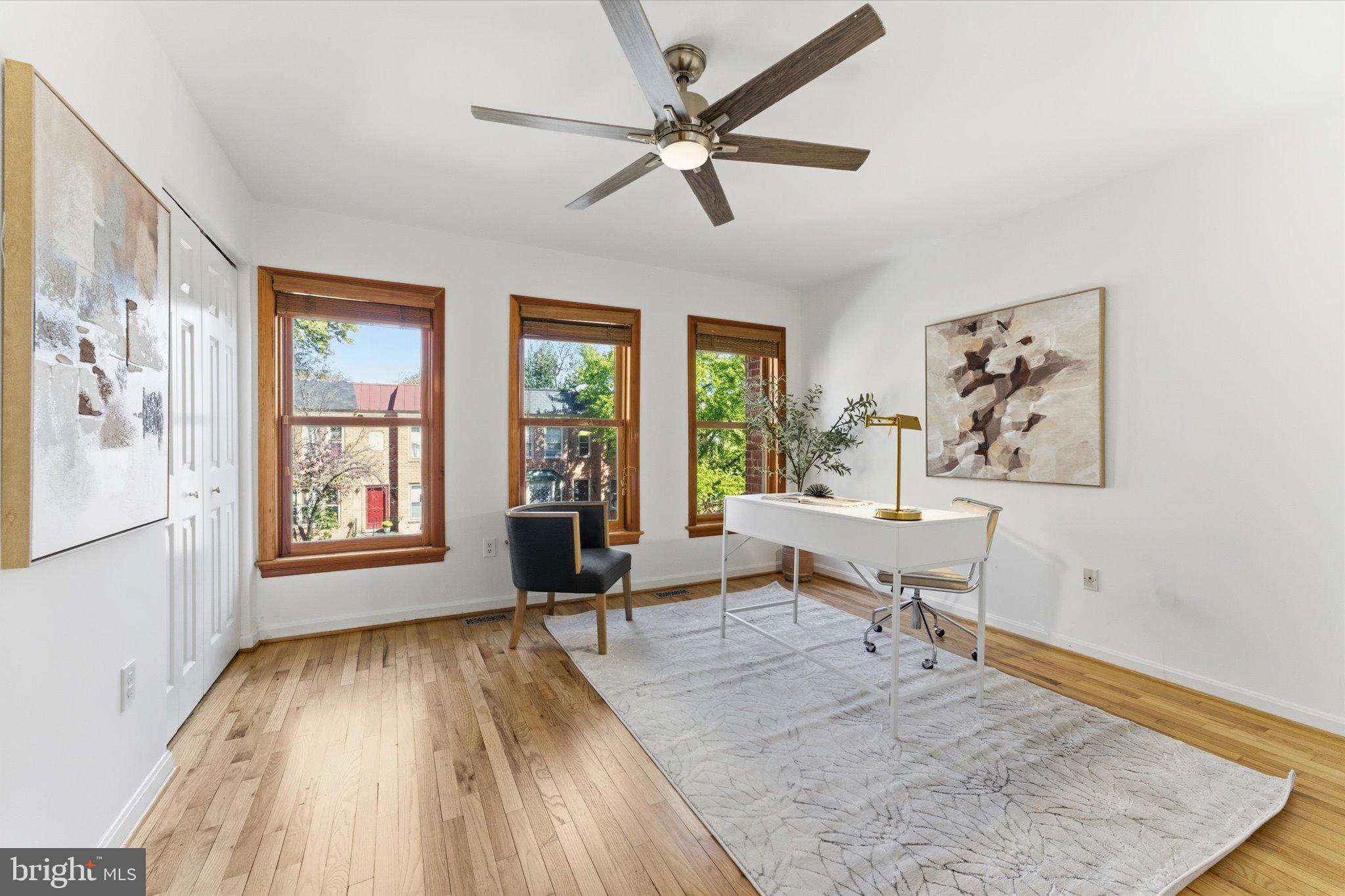 1645 Park Road Northwest Washington, DC 20010 - Photo 17 of 28 a living room with furniture and a window
