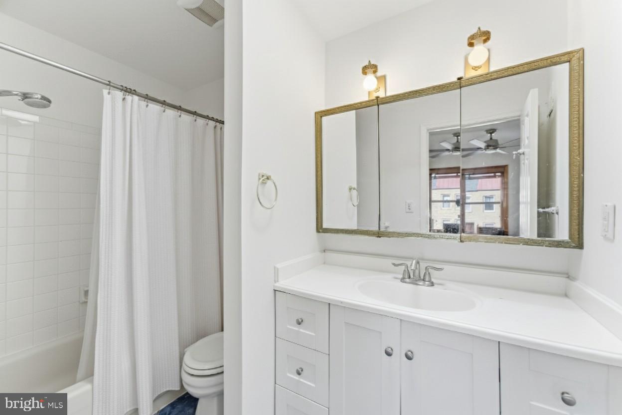 1645 Park Road Northwest Washington, DC 20010 - Photo 20 of 28 a bathroom with a sink a toilet and shower