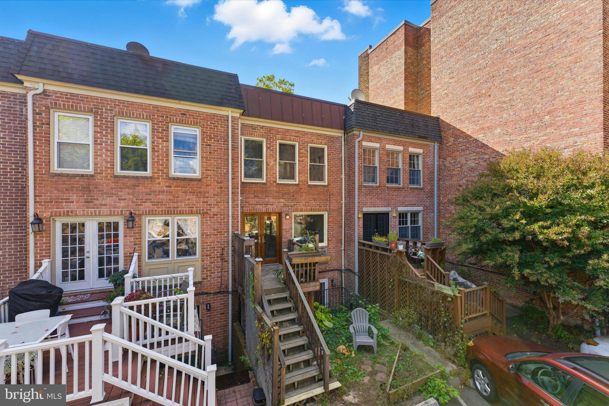 1645 Park Road Northwest Washington, DC 20010 - Photo 25 of 28 a front view of a house with balcony