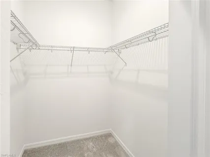 a view of small space with racks on the wall