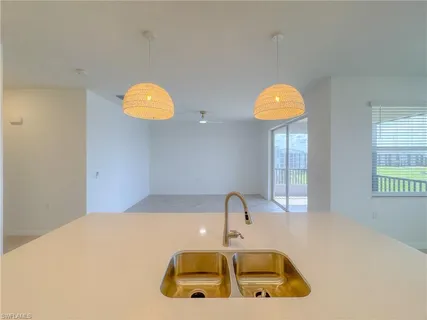 a bathroom with a sink and a window