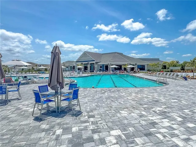 a view of a house with a yard porch and sitting area