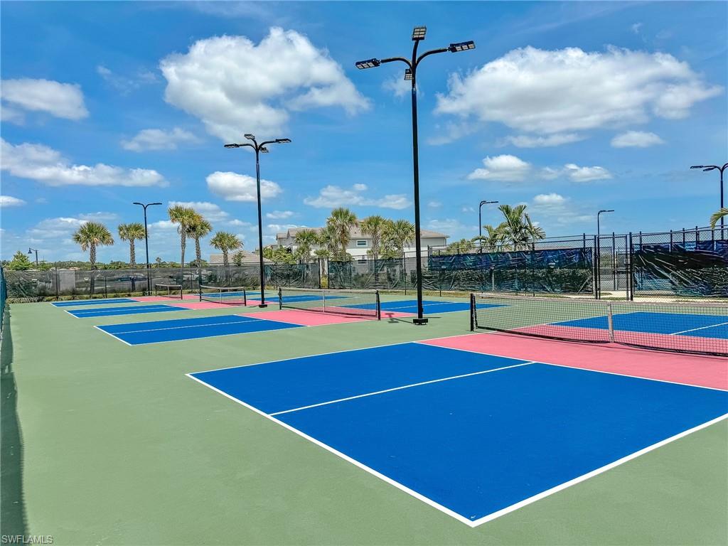5583 Double Eagle Circle, Unit 4141 Ave Maria, FL 34142 - Photo 46 of 50 a view of a tennis court