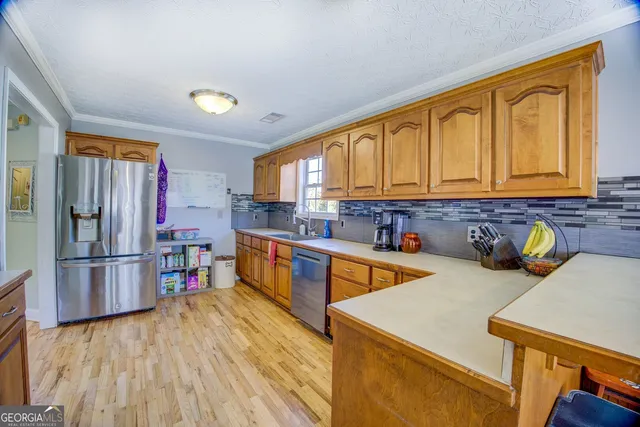 a room with furniture and a flat screen tv