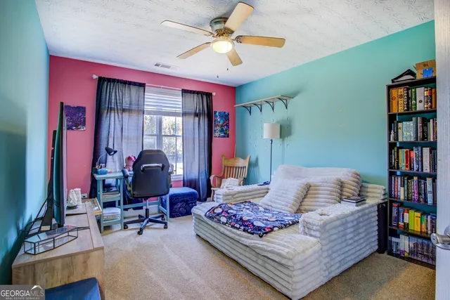 a room with furniture and a window