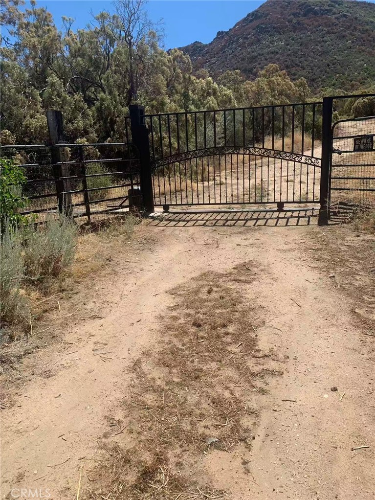 a view of outdoor space with deck and mountain view