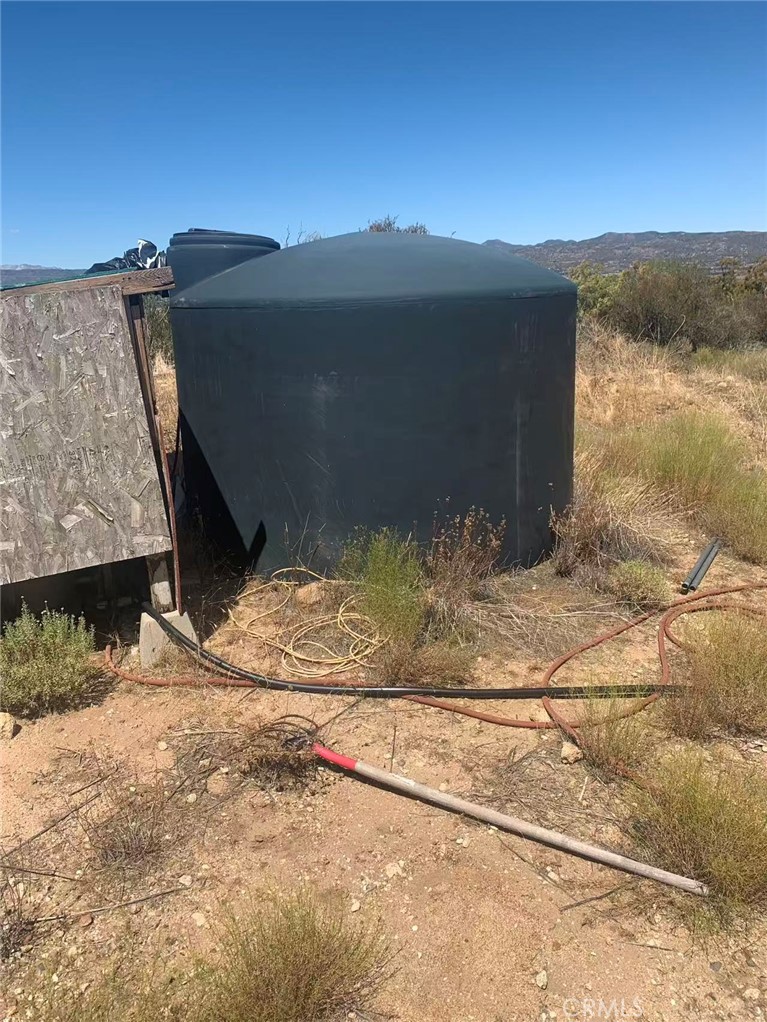 57775 Running Springs Road Anza, CA 92539 - Photo 4 of 13 a view of a house with a yard