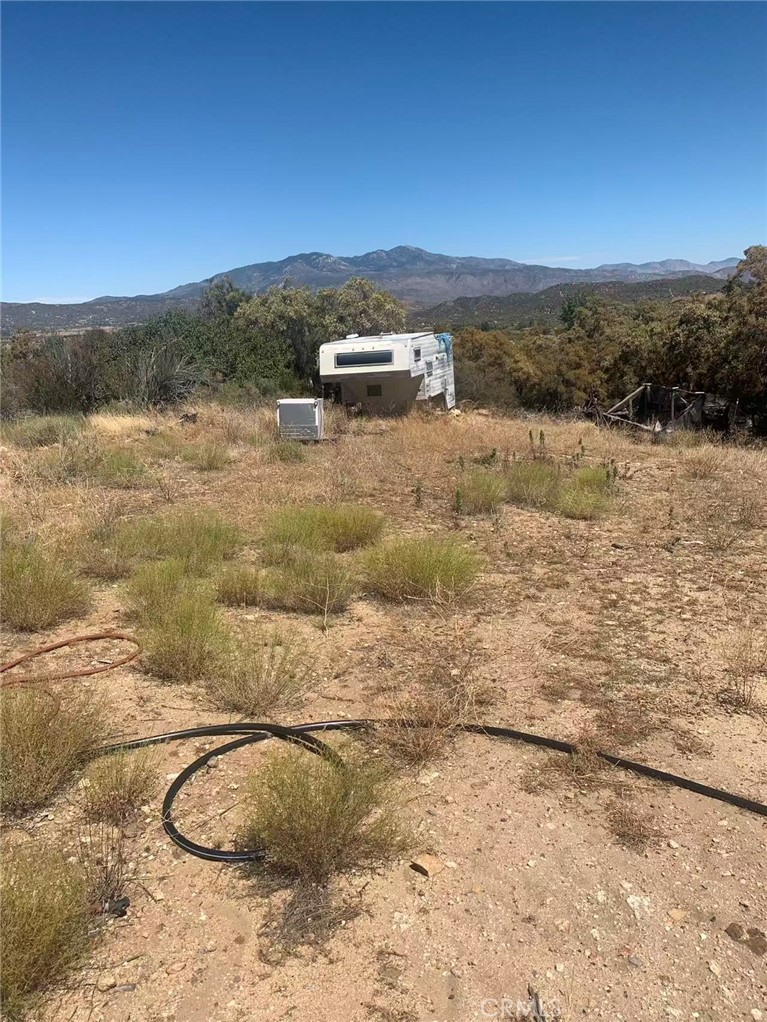 57775 Running Springs Road Anza, CA 92539 - Photo 5 of 13 a view of swimming pool with mountain in the background