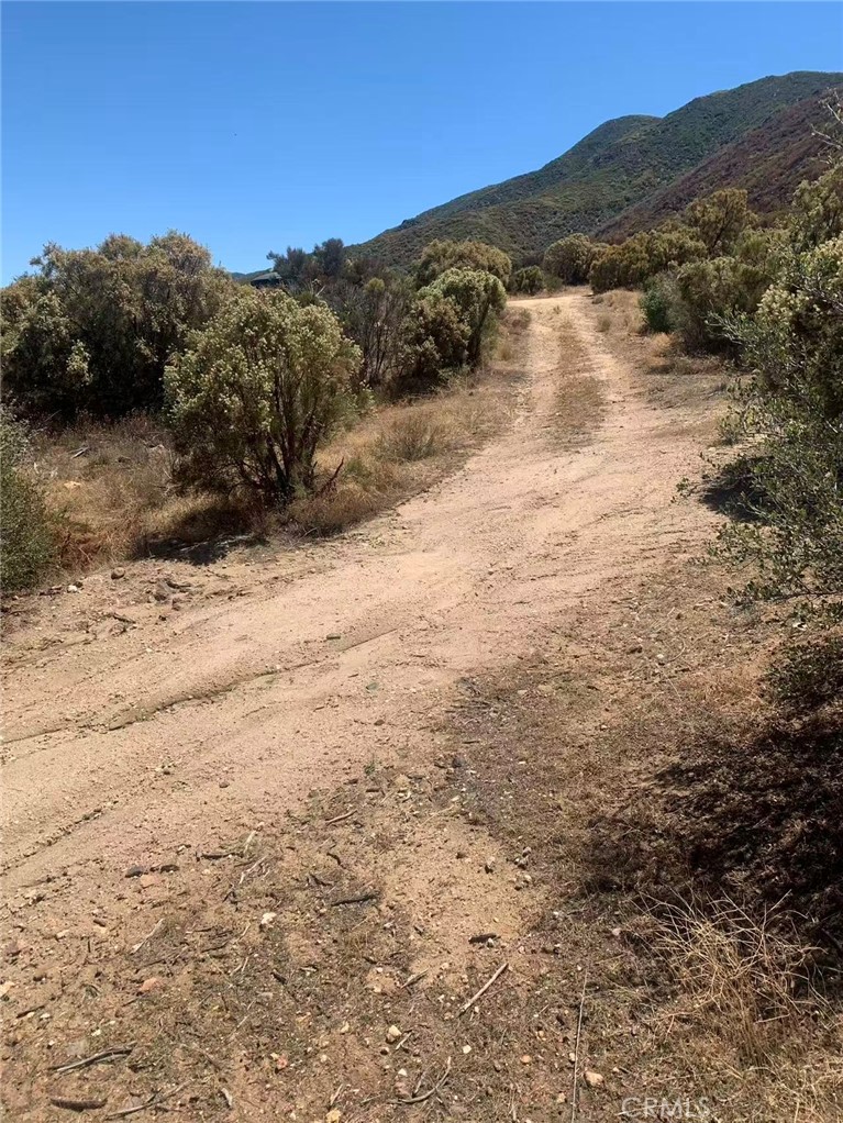 57775 Running Springs Road Anza, CA 92539 - Photo 7 of 13 a view of a large mountain with a mountain in the background