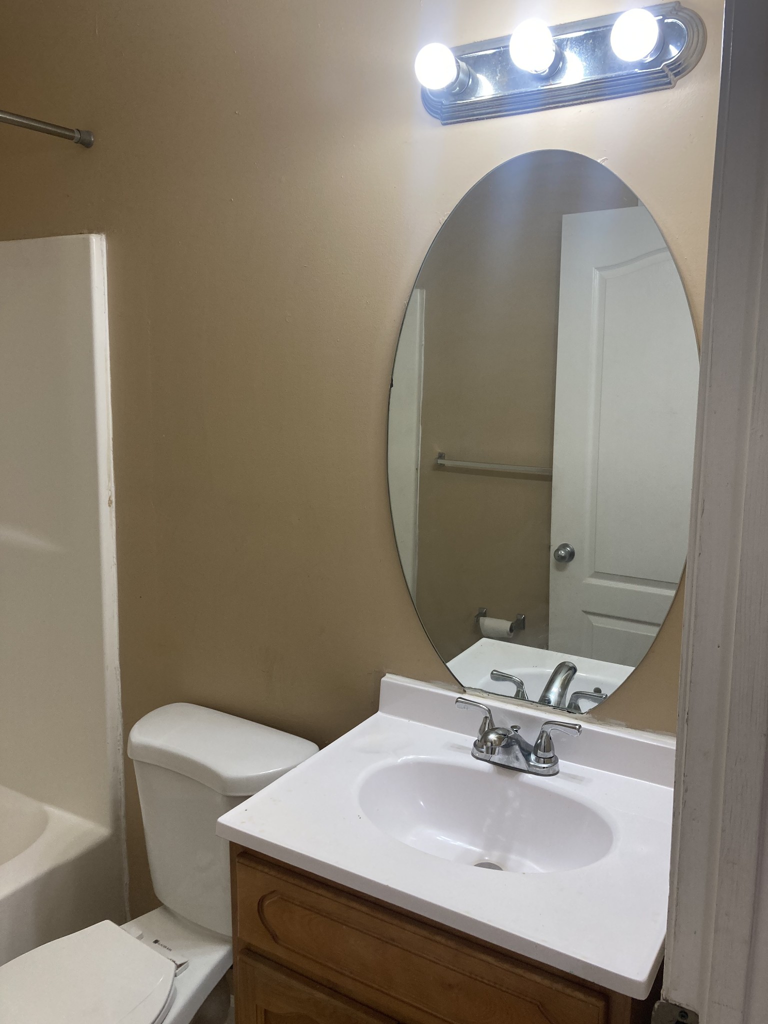1811 16th Avenue North, Unit B Nashville, TN 37208 - Photo 12 of 13 a bathroom with a sink and a mirror