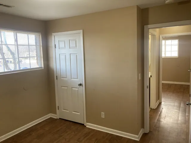 a white refrigerator freezer and a stove sitting inside of a kitchen