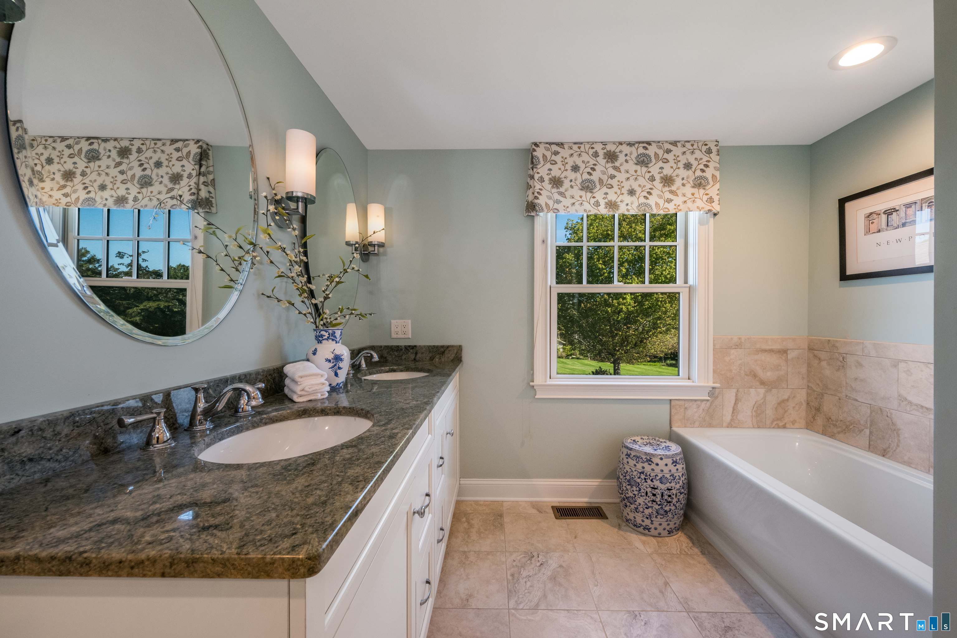 28 Walden Hill Road Guilford, CT 06437 - Photo 20 of 35 a bathroom with a granite countertop tub a sink and a window