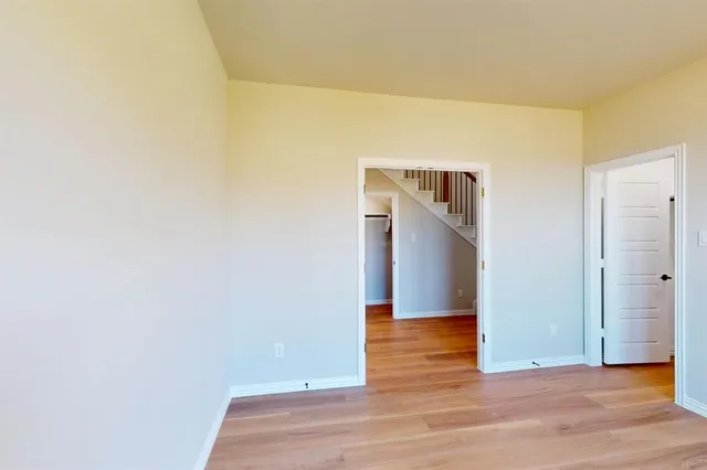 a view of a livingroom with wooden floor
